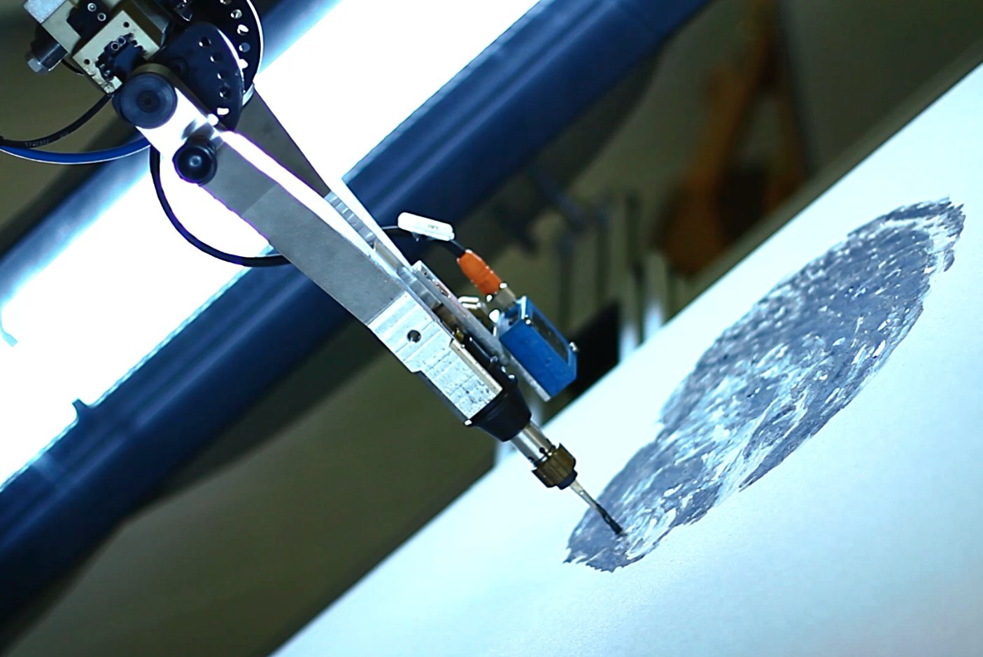 Hardware-Based Non-Photorealistic Rendering Using a Painting Robot